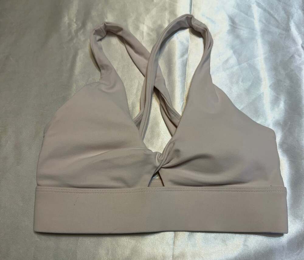 Fabletics Oasis Twist Front Sports Bra Light Pink